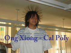 Ong Xiong - Cal Poly Architecture student holding a static ball so his hair stands up